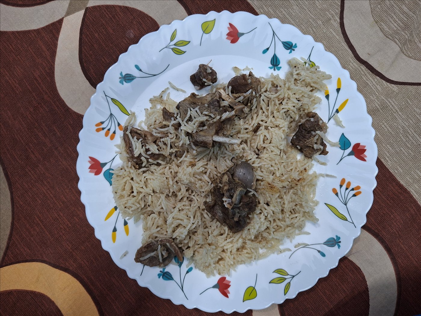 Mutton dum biryani with tender lamb and saffron basmati rice
