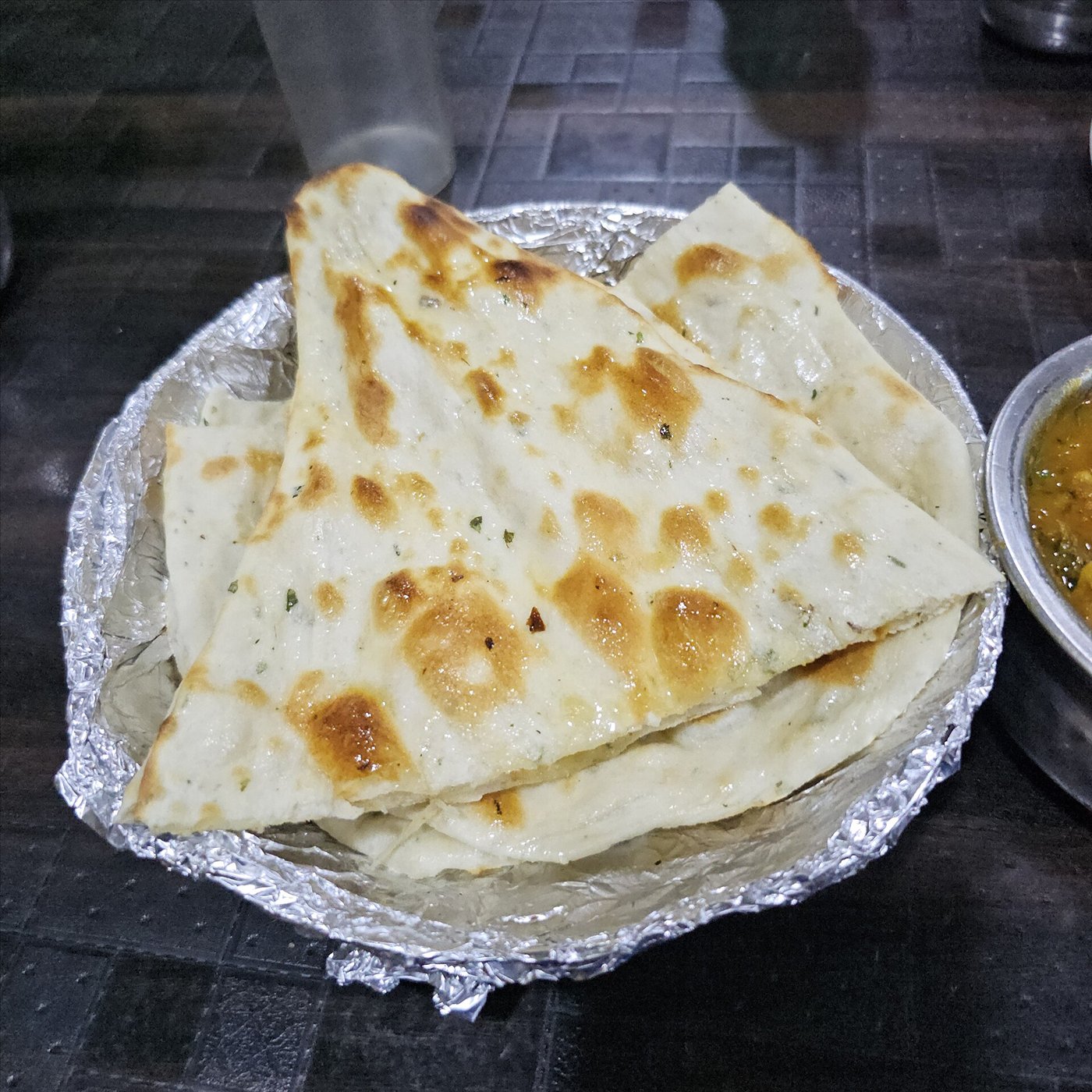 Soft butter naan flatbread fresh from the tandoor