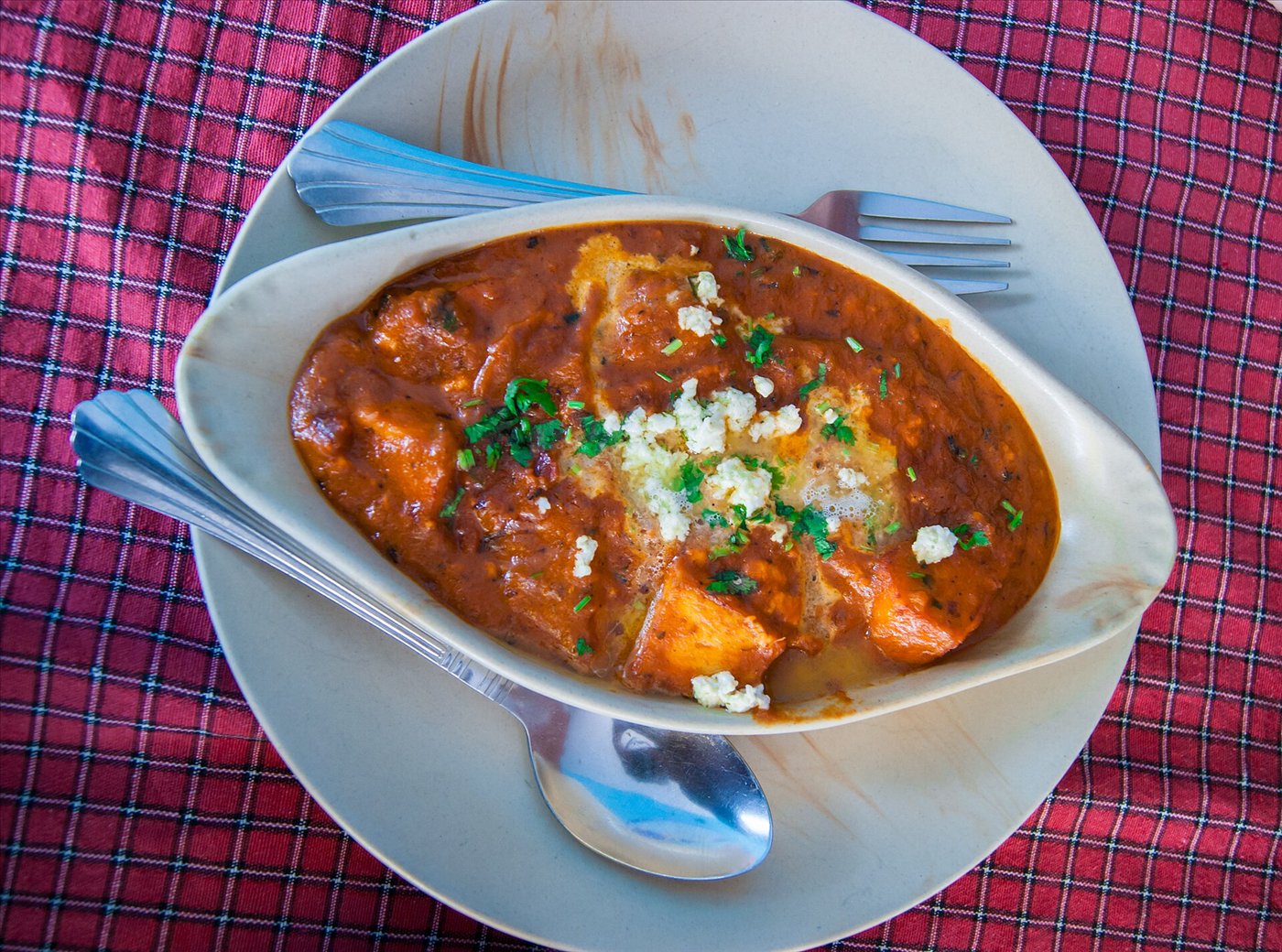 Paneer butter masala, paneer cubes in a rich tomato butter gravy